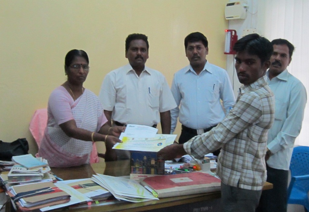 Mrs Suguna D.I.O IFAD  PTSLP Thiruvallur district issuing certificates in the presence of Mr.Shanmugam C.E.O Capital CNC to the candidates trained through IFAD.
